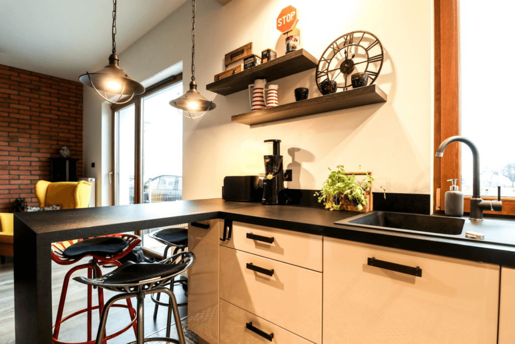 Aranżacja salonu z kuchnią - styl loftowy